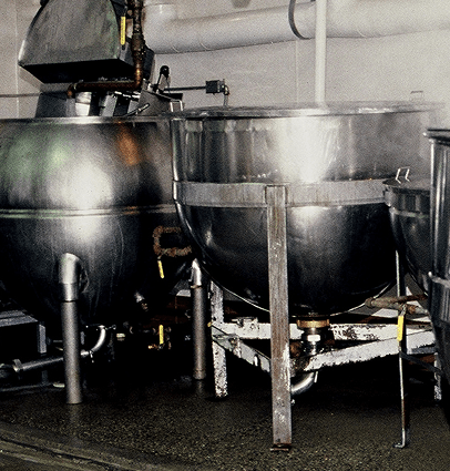 Stainless steel kettles in the Kettle Cuisine production kitchen